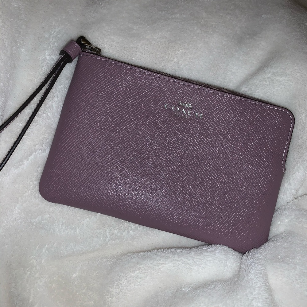 NWT Coach Wristlet in a soft jasmine color